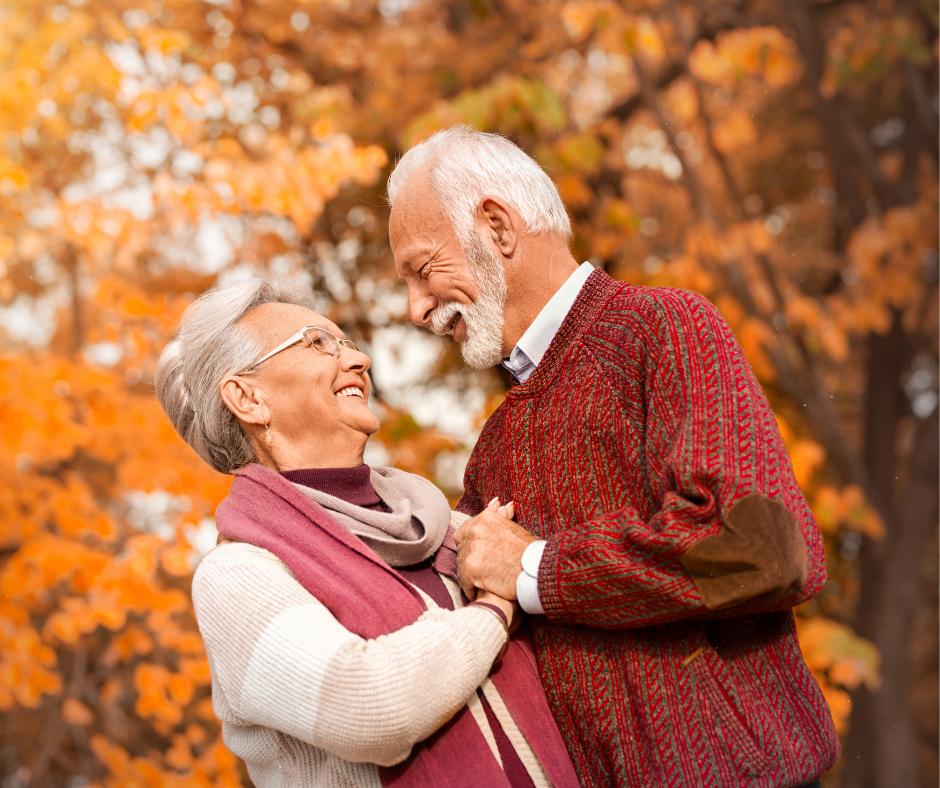 Older Couple Enjoys Fall Foliage before discussing their estate planning.