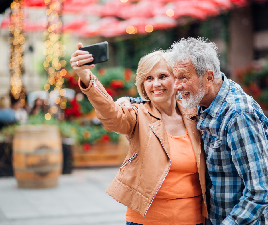 Older Couple taking a selfie, while living with Dementia.